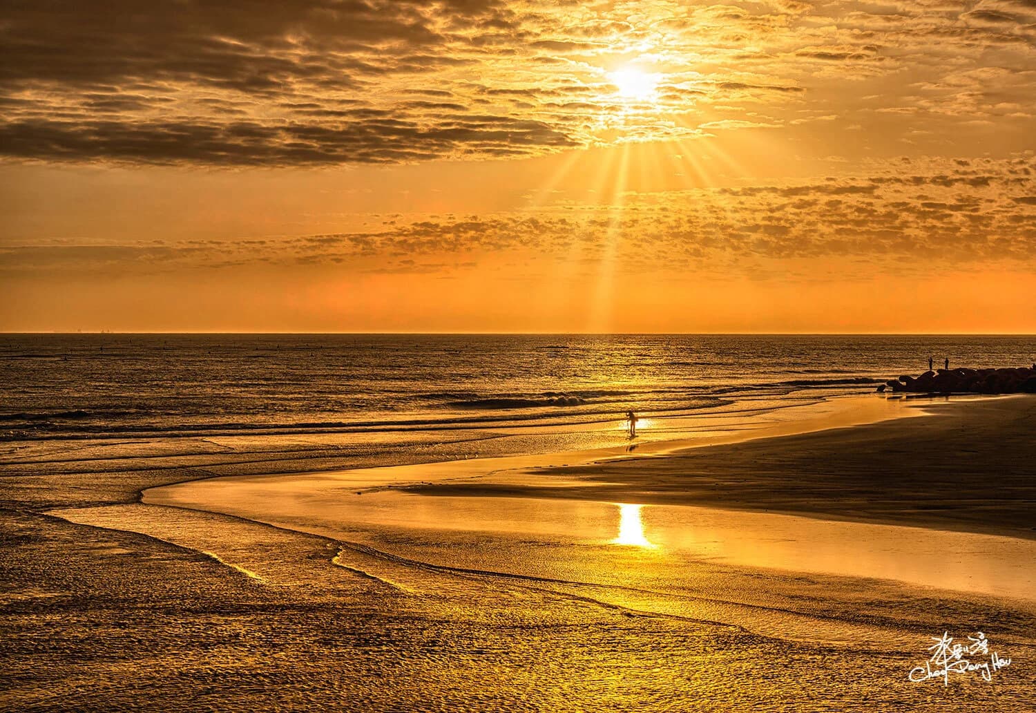 夕陽西下漁人尋寶-許釗滂攝影