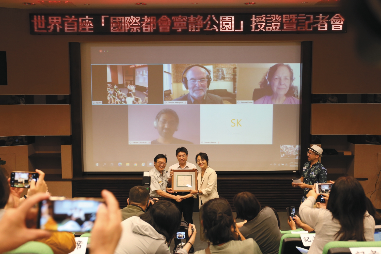 記者會當天，QPI 總裁喬罕、秘書長戈登．漢普頓等人透過視訊一同見證這別具意義的時刻／陽管處 提供