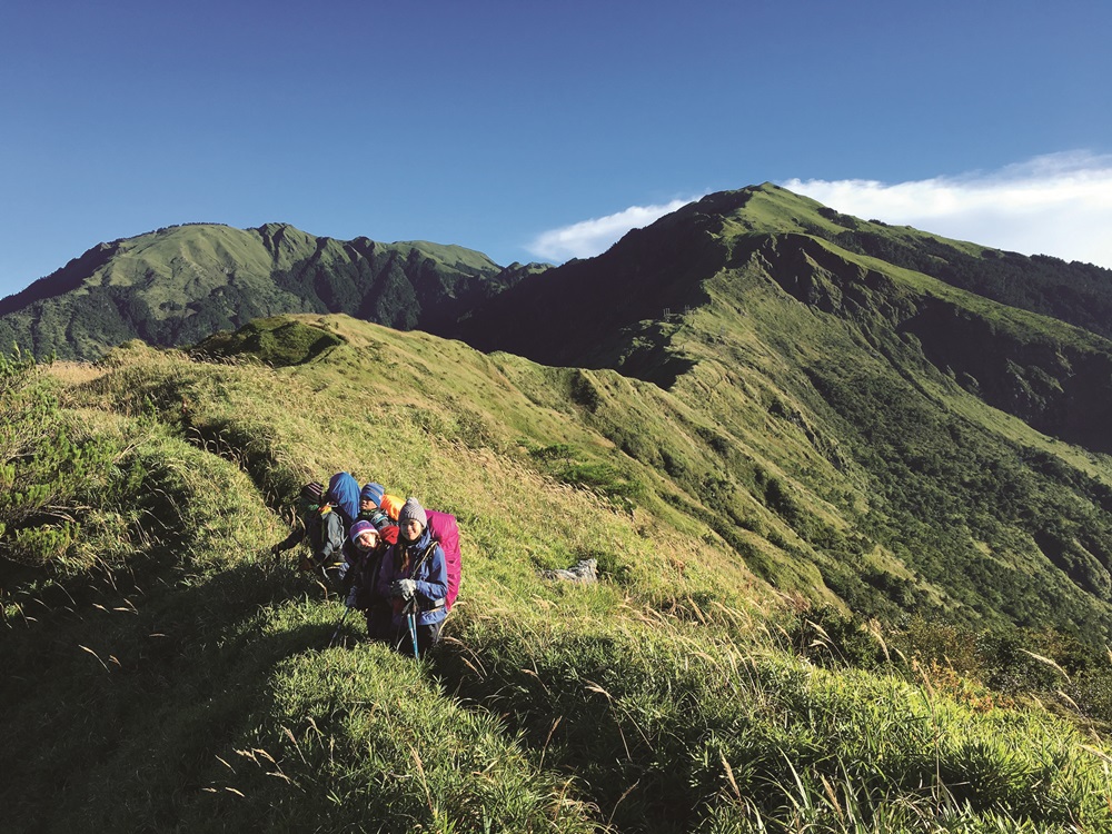 Climbing to the summit is not an act of conquering, but the way to
enjoy natural scenery / Photo by Huang Wen-Ke