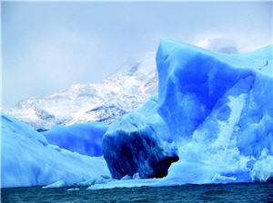 The ice crystal of the glacier has the color of sapphire