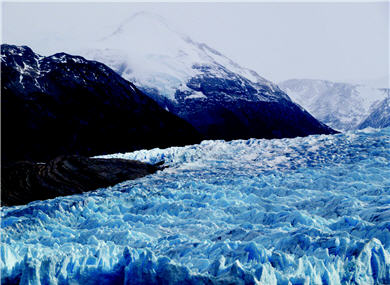 The heavy layers of Grey Glacier in Paine National Park generate huge cutting pressure on both sides