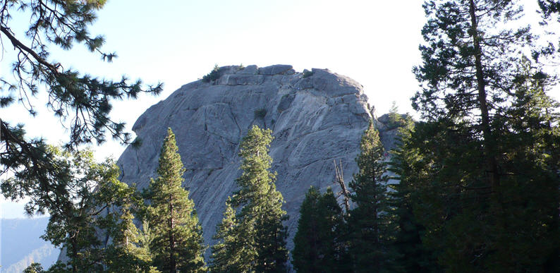 If looking up from the bottom of the valley makes one feel diminished, he can climb up to Mono Rock and look down upon the beautiful land