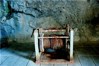 The winch on the right side of the water channel was utilized to elevate the iron water gate.