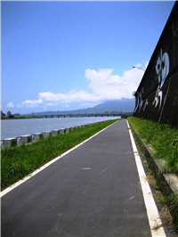 High embankments on both sides of the river. Can we really conquered nature?”/by Wan-ching La