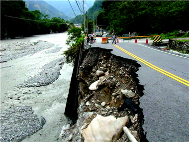 Lateral erosion of the Tachia River has broken off the roads.