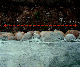 The surface of the pebble pile has to be even so the entire layer can be firm and stable.