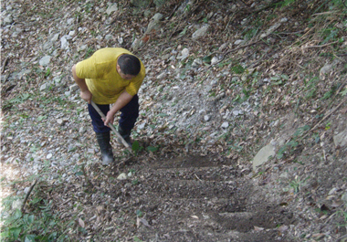 Park rangers repair mountain cabins, set up road signs, remove fallen tress, set up aluminum ladders, and clear paths./ by Buya