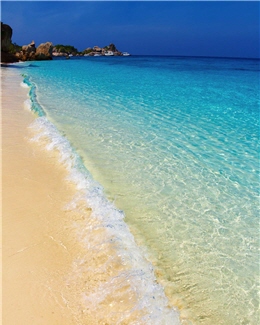 The long bay on Similan Islands is a natural hideaway that has been embraced by tourists. / by Dmitry