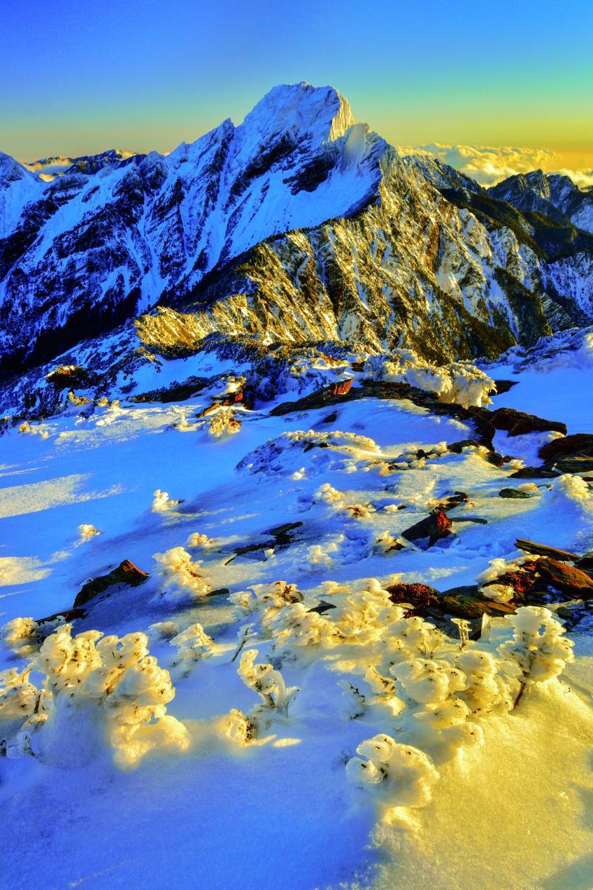 Yushan blanketed in snow during winter.